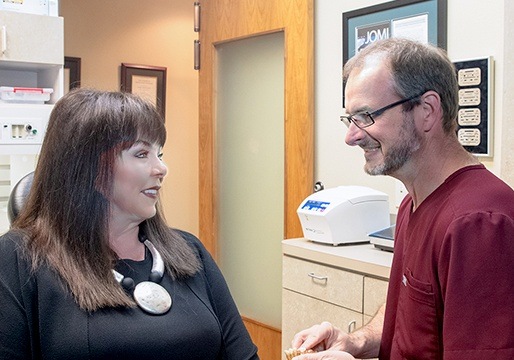 Dr. Hodges working with patient